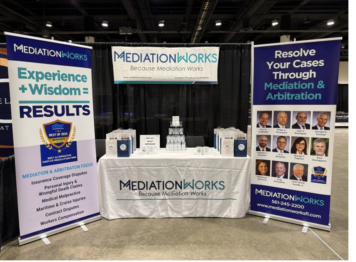 The MediationWorks booth at the Windstorm Insurance Network conference, 2026